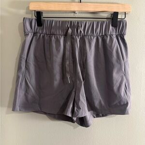 Gray Athletic Shorts with Drawstring Closure and Mid-Thigh Length